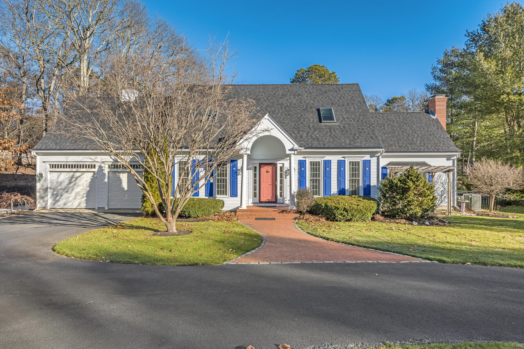 683 Mistic Drive Marstons Mills, MA 02648 - Photo 2 of 50 a front view of a house with a garden and tree