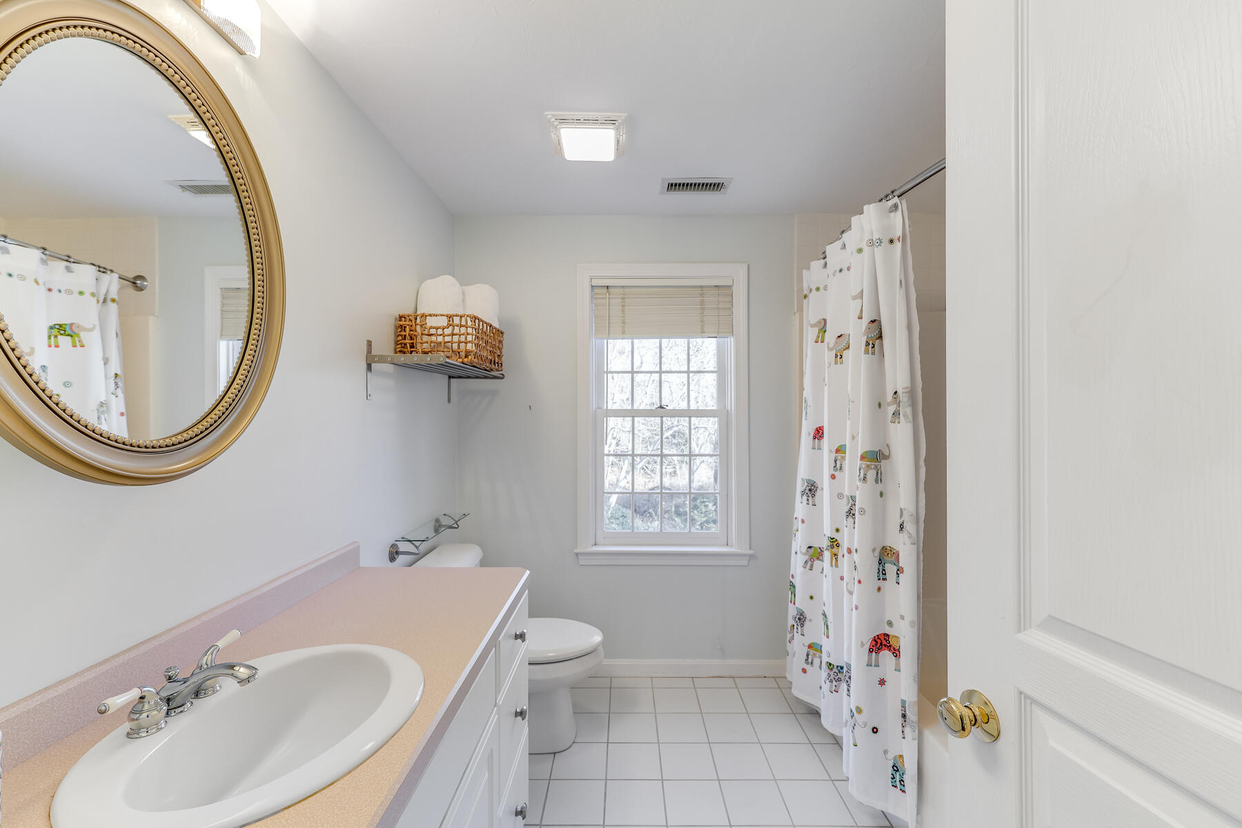 683 Mistic Drive Marstons Mills, MA 02648 - Photo 39 of 50 a bathroom with a sink a toilet and a mirror
