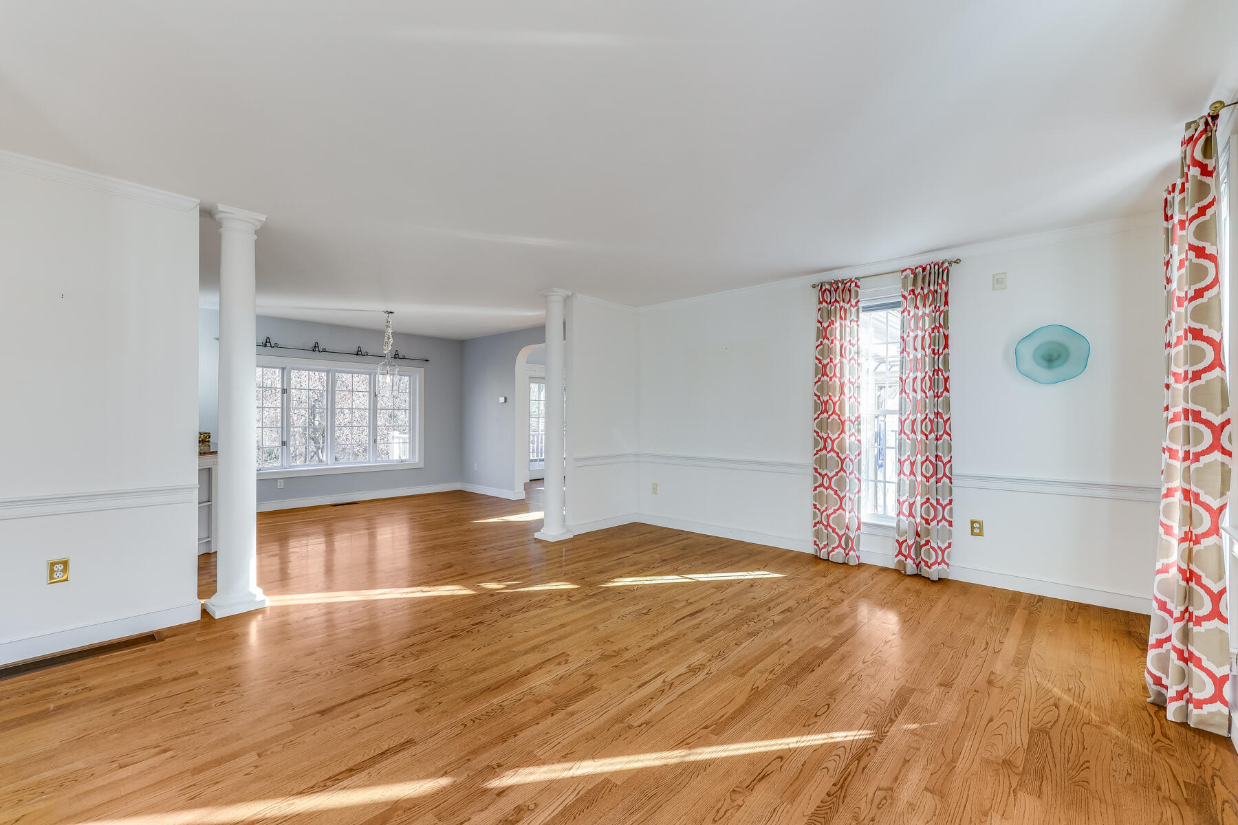 683 Mistic Drive Marstons Mills, MA 02648 - Photo 43 of 50 a view of empty room with wooden floor and fan