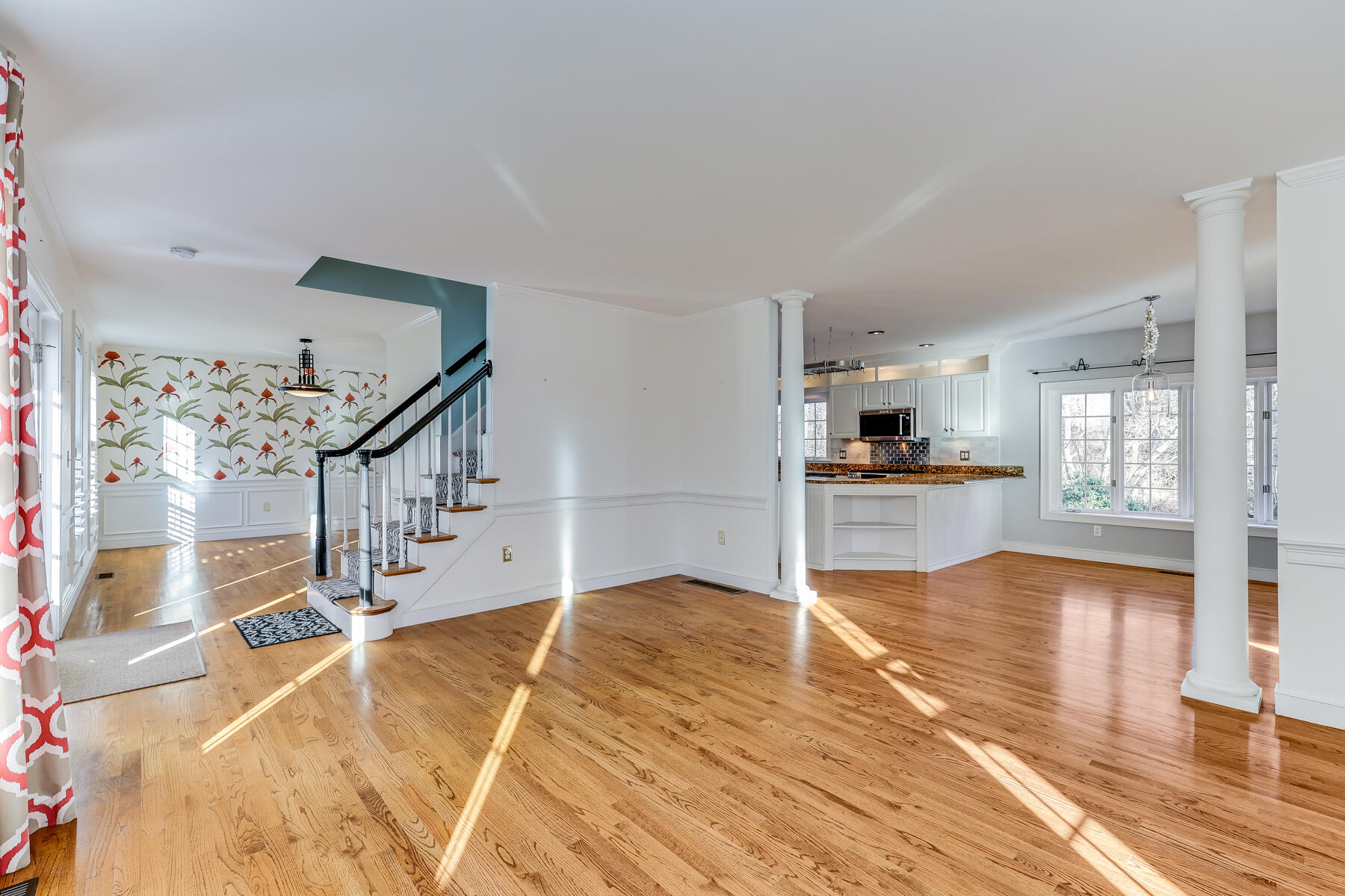 683 Mistic Drive Marstons Mills, MA 02648 - Photo 45 of 50 a view of kitchen and dining room with wooden floor