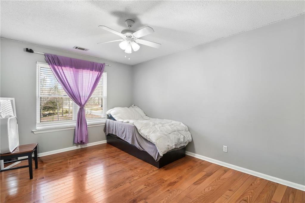 367 Benjamin Drive Rockmart, GA 30153 - Photo 24 of 34 a spacious bedroom with a bed and a window