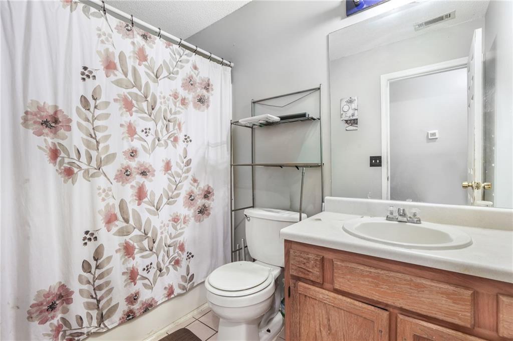 367 Benjamin Drive Rockmart, GA 30153 - Photo 29 of 34 a bathroom with a sink toilet and shower