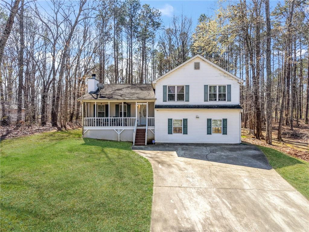 367 Benjamin Drive Rockmart, GA 30153 - Photo 3 of 34 a front view of a house with a yard