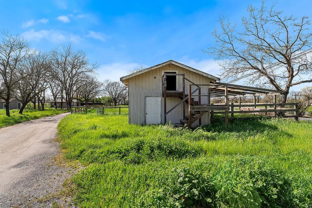 672 Irwin Lane Santa Rosa, CA 95401 - Photo 10 of 35 a front view of a house with a yard