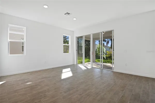 an empty room with windows