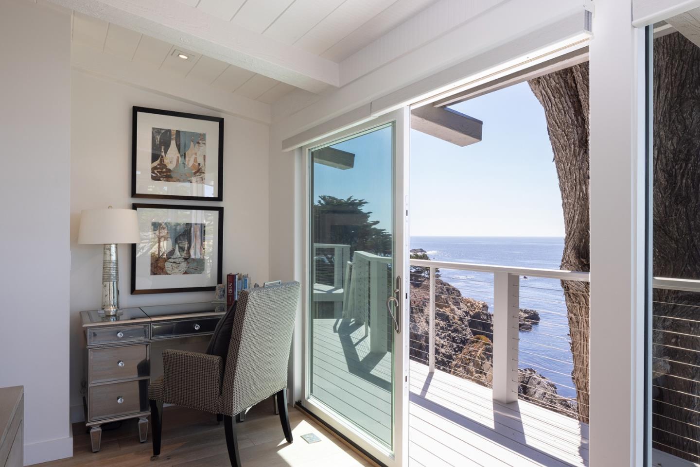 162 Spindrift Road Carmel, CA 93923 - Photo 11 of 34 a view of a hallway with workspace and window