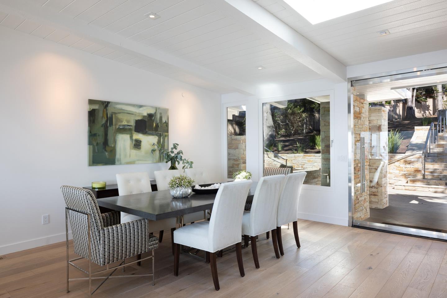 162 Spindrift Road Carmel, CA 93923 - Photo 17 of 34 a dining room with furniture and wooden floor