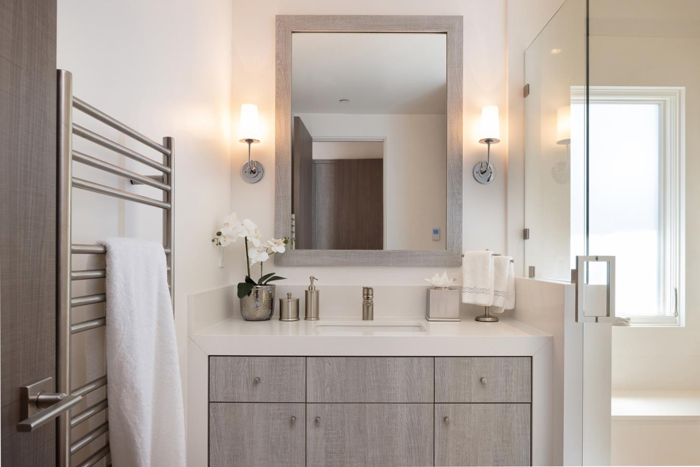 162 Spindrift Road Carmel, CA 93923 - Photo 21 of 34 a bathroom with a sink and a mirror