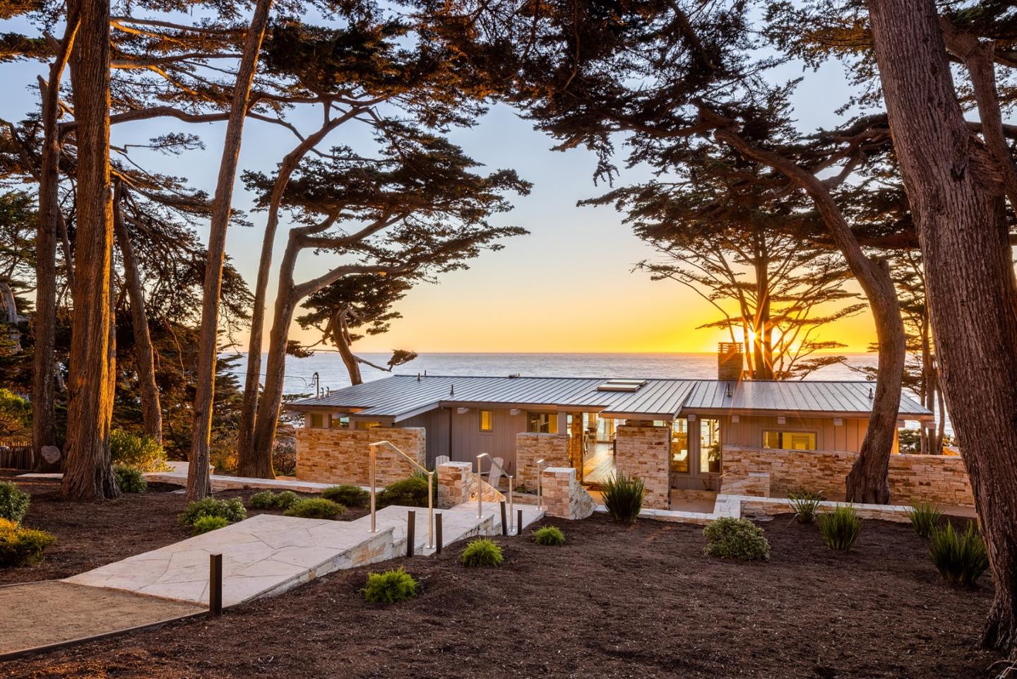 162 Spindrift Road Carmel, CA 93923 - Photo 33 of 34 a view of a house with a yard tree and sitting area