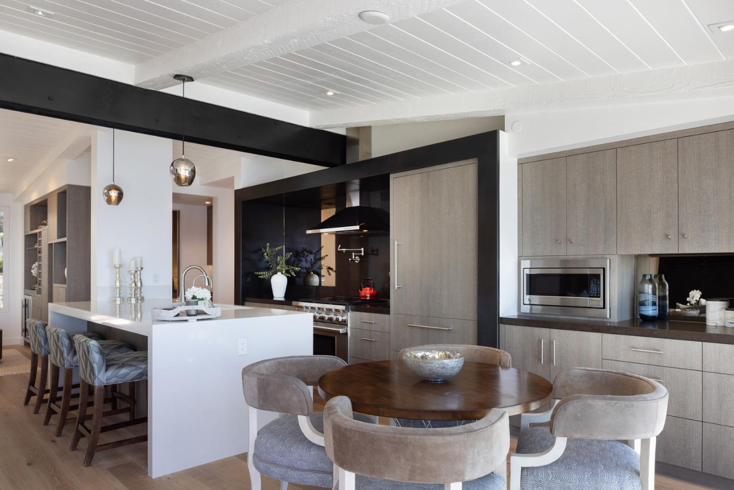 162 Spindrift Road Carmel, CA 93923 - Photo 5 of 34 a kitchen with a table and chairs