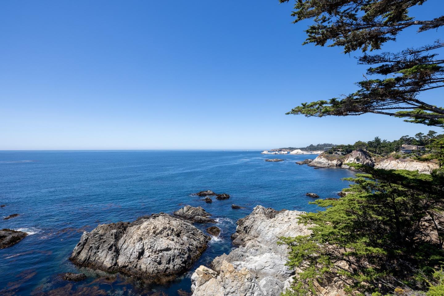 162 Spindrift Road Carmel, CA 93923 - Photo 9 of 34 an aerial view of ocean house ocean and mountain view in back