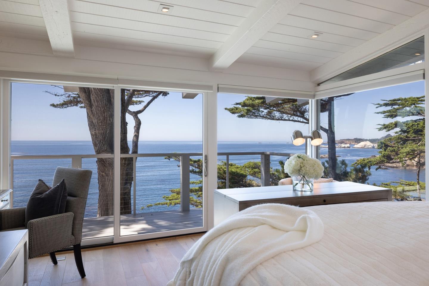 162 Spindrift Road Carmel, CA 93923 - Photo 10 of 34 a living room with furniture and a floor to ceiling window