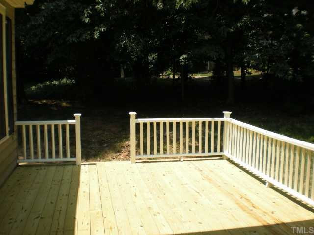 2300 Countrywood Road North Raleigh, NC 27615 - Photo 9 of 12 Oversized deck features recently replaced deck boards plus partially covered rear porch. Other