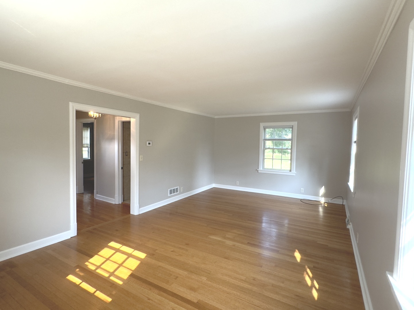 15751 Burr Oak Road Plano, IL 60545 - Photo 3 of 7 a view of an empty room and window