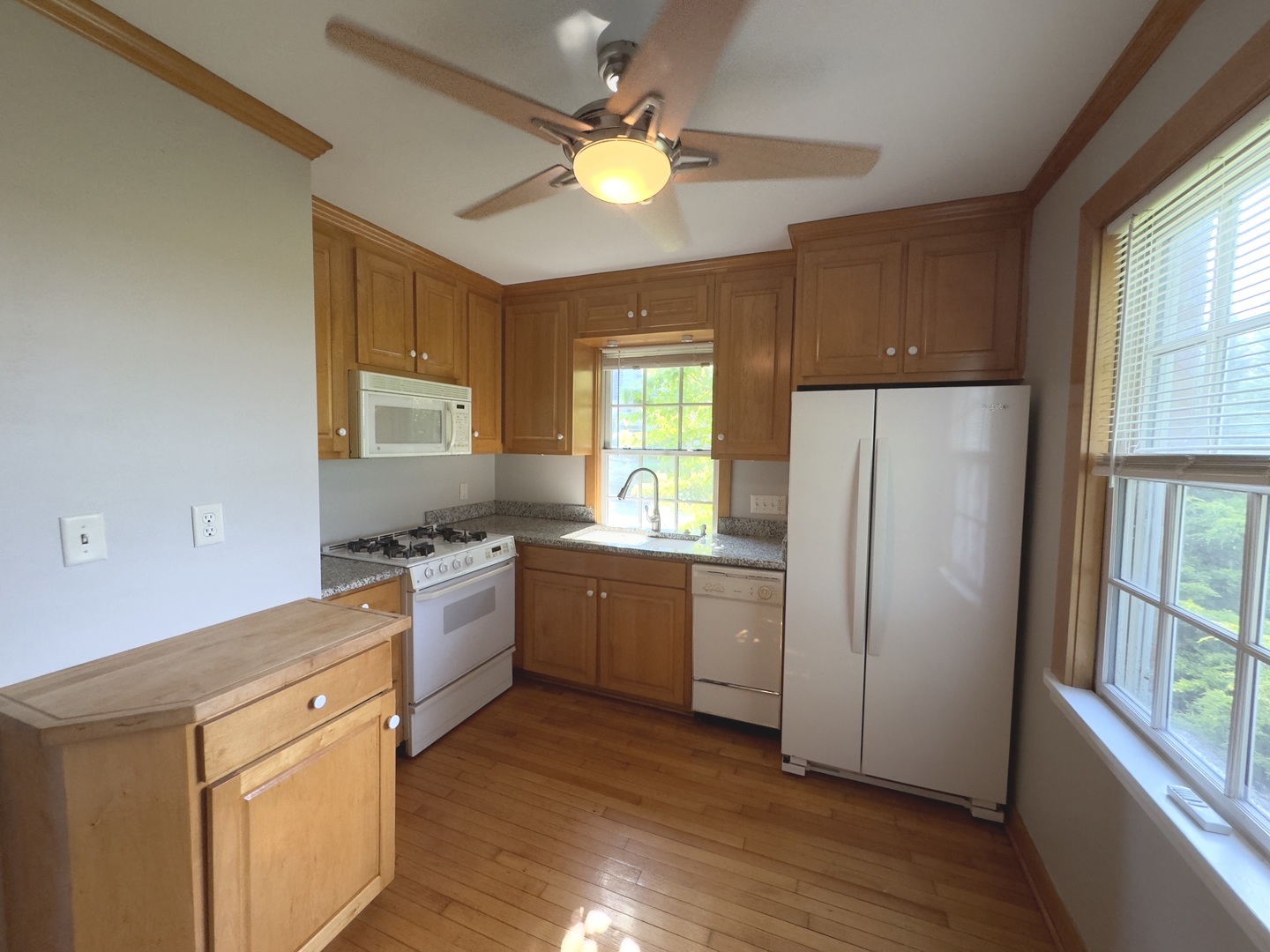 15751 Burr Oak Road Plano, IL 60545 - Photo 6 of 7 a kitchen with a refrigerator sink and a stove