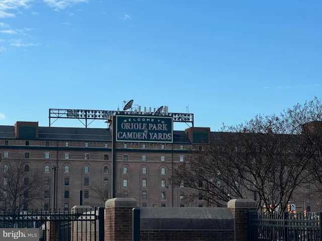 a view of roof with city view
