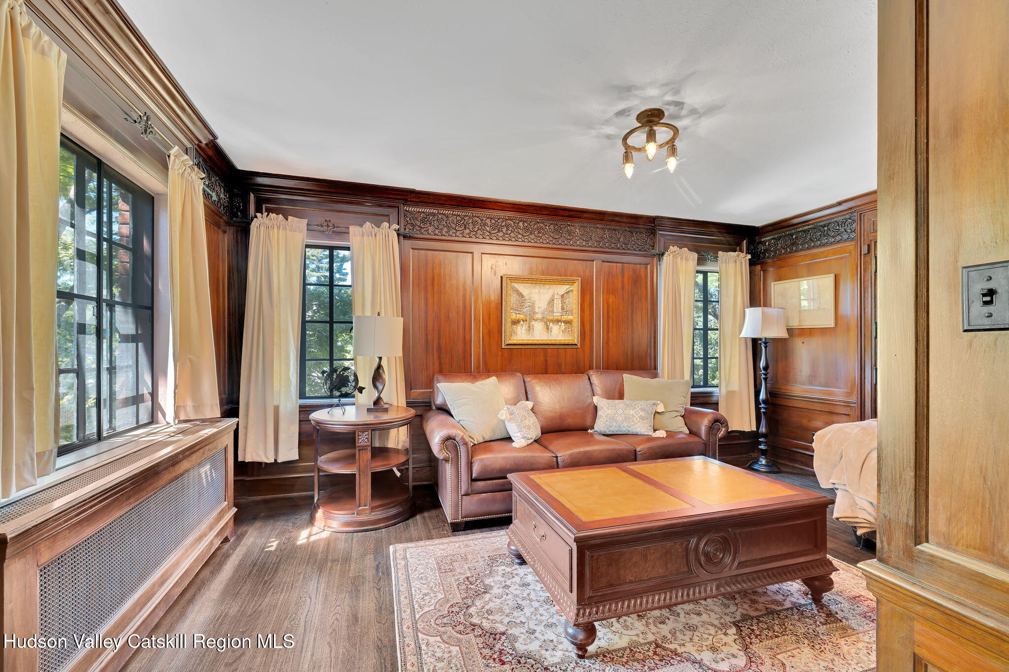 11 Seaman Road Poughkeepsie, NY 12601 - Photo 13 of 49 a living room with furniture and large windows