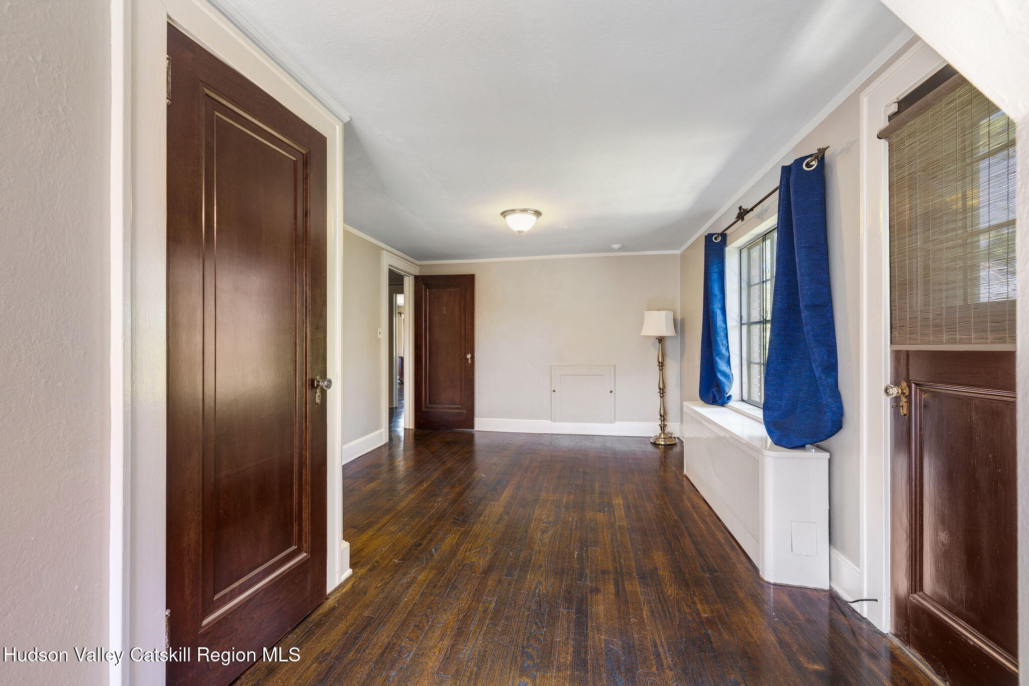 11 Seaman Road Poughkeepsie, NY 12601 - Photo 29 of 49 a view of hallway with wooden floor and stairs