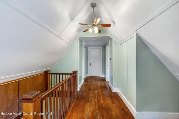 a view of a hallway view with staircase