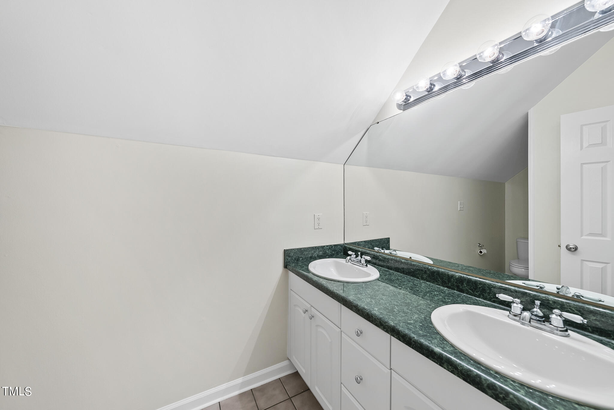 7608 Harborough Court Raleigh, NC 27613 - Photo 22 of 27 Upstairs Bathroom