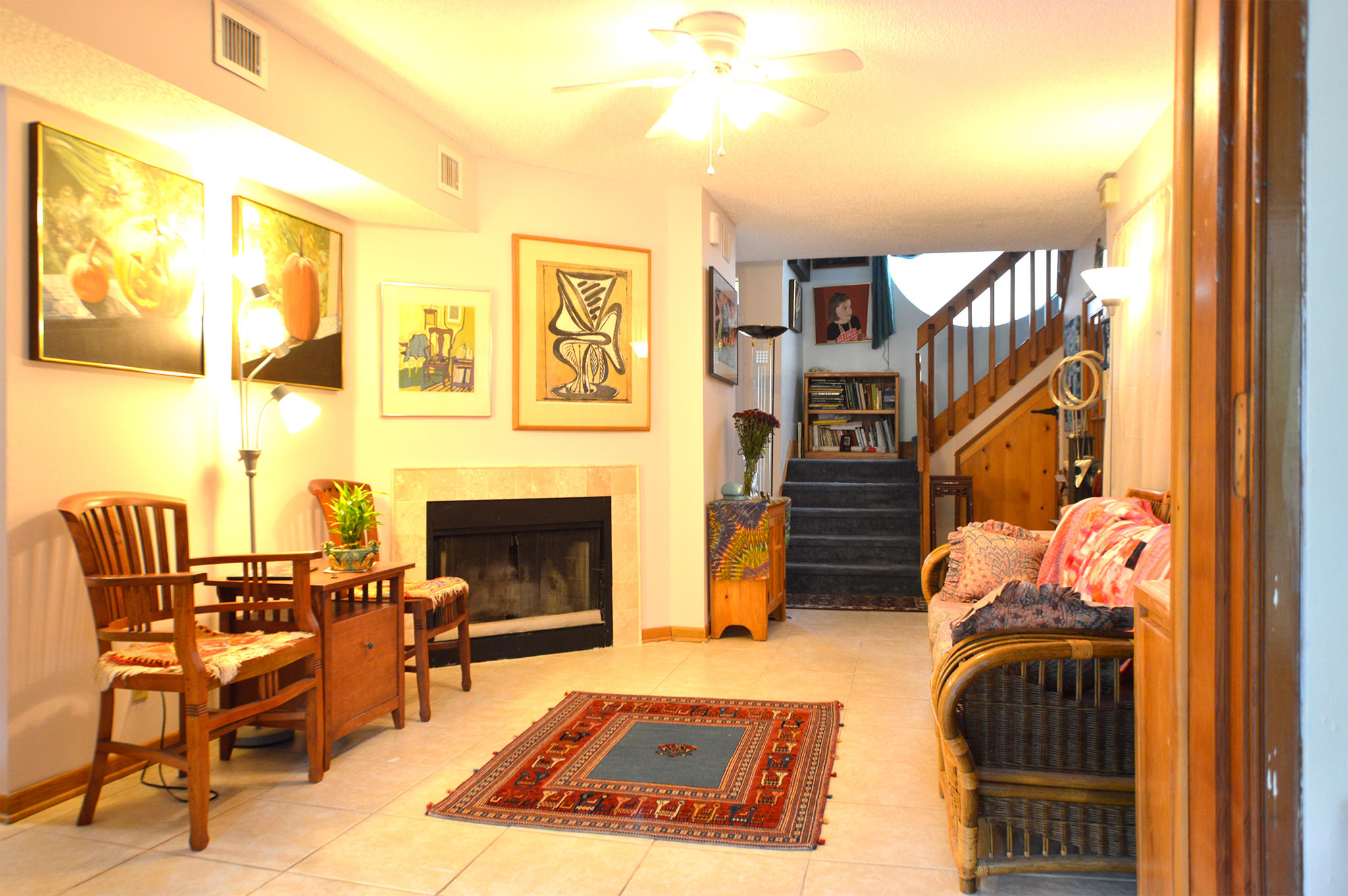 5273 Adams Road Delray Beach, FL 33484 - Photo 3 of 28 a living room with furniture a fireplace and a large window