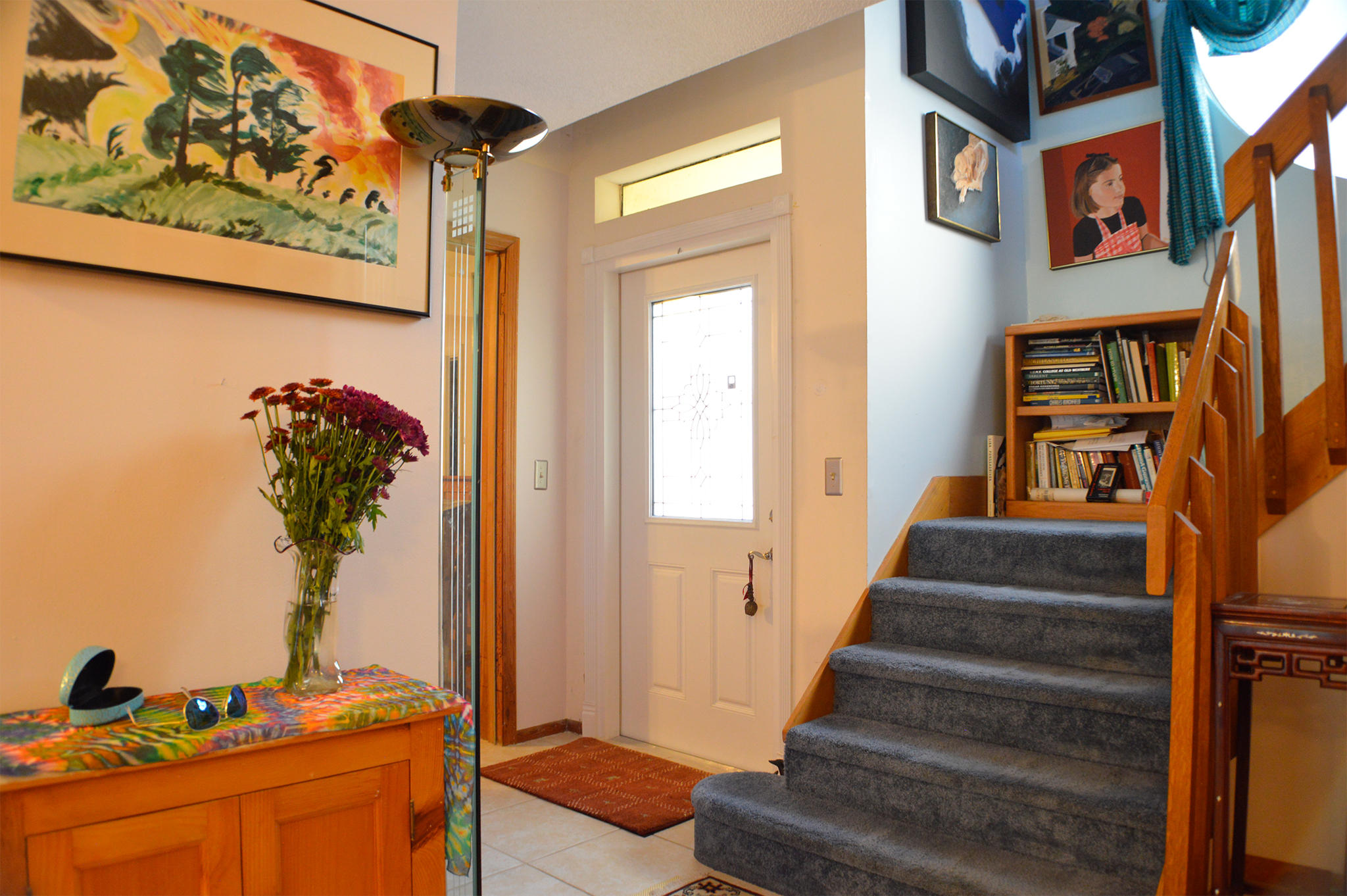 5273 Adams Road Delray Beach, FL 33484 - Photo 6 of 28 a view of staircase with wooden floor and a potted plant