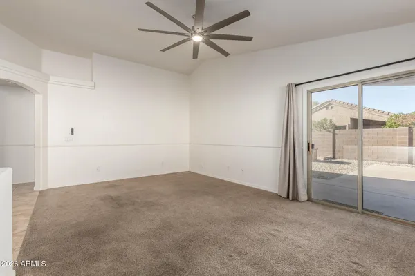 an empty room with fan