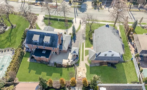 an aerial view of a house with outdoor space pool seating area and outdoor