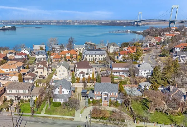 a view of a city with an ocean view