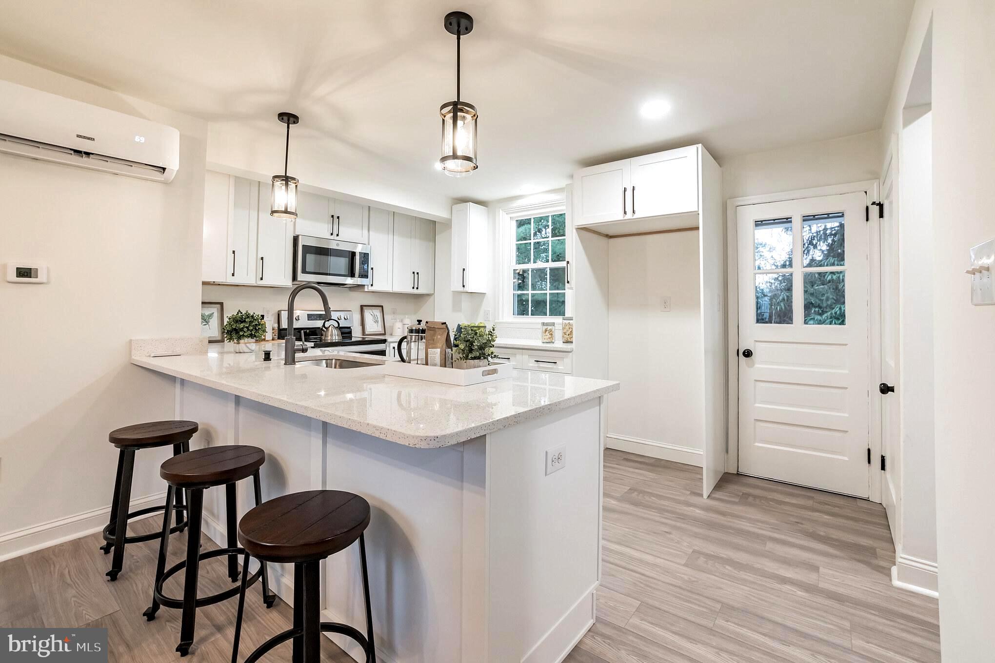 115 Beech Road Wallingford, PA 19086 - Photo 10 of 30 Kitchen Eating Area & Exit