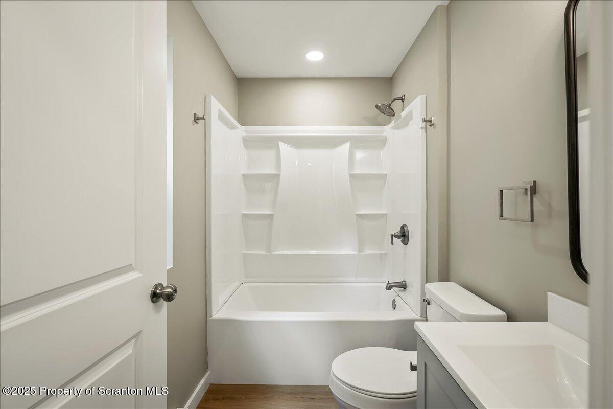 820 822 Delaware Street Scranton, PA 18509 - Photo 29 of 48 a bathroom with a toilet and a bath tub
