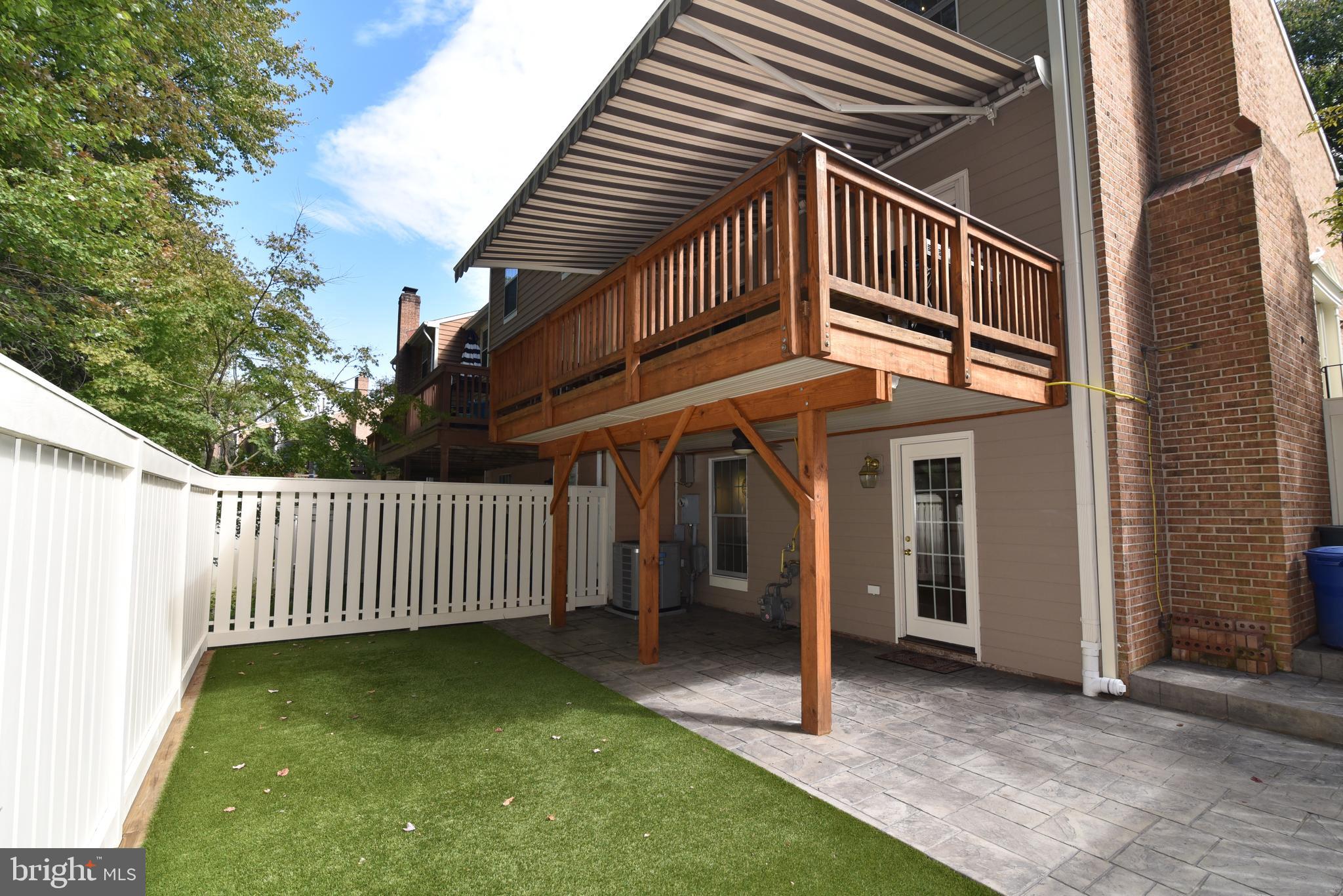 1537 Autumn Ridge Circle Reston, VA 20194 - Photo 2 of 43 Rear -Trex Deck with Awning & Stamps Concrete