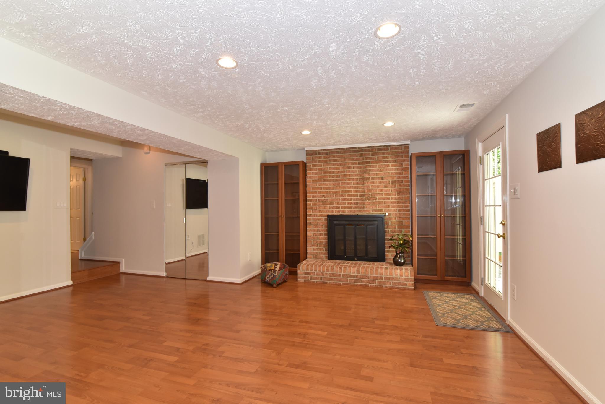 1537 Autumn Ridge Circle Reston, VA 20194 - Photo 26 of 43 Rec Room with Gas Fireplace
