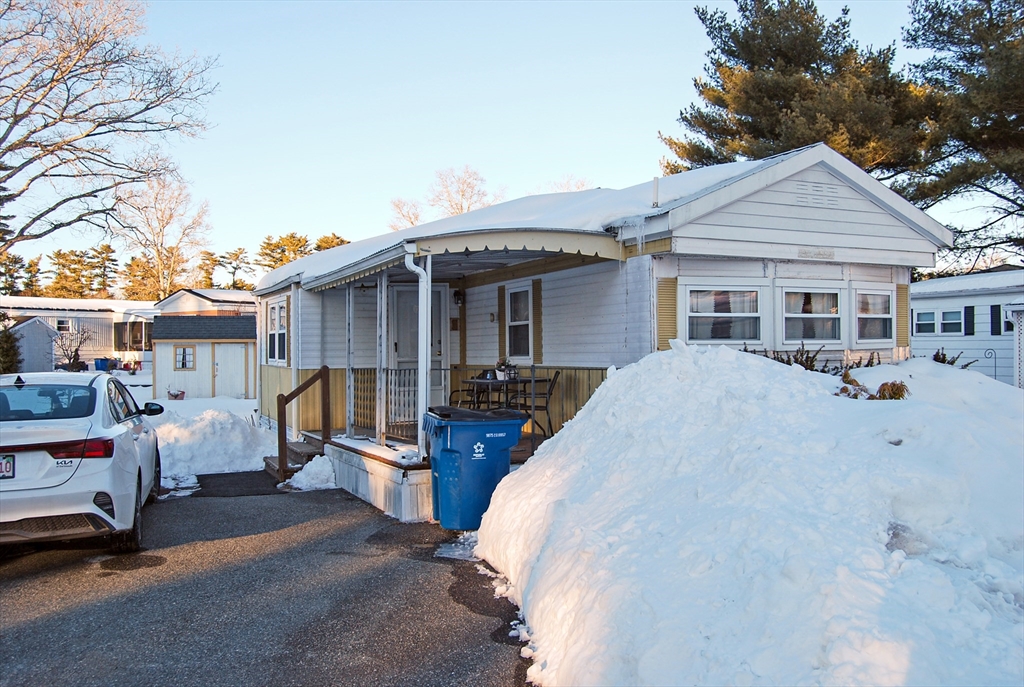 a view of a house with sitting area