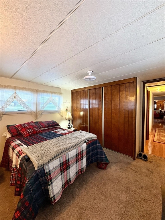 9 King Drive Wareham, MA 02576 - Photo 12 of 12 a bed room with a bed and a window