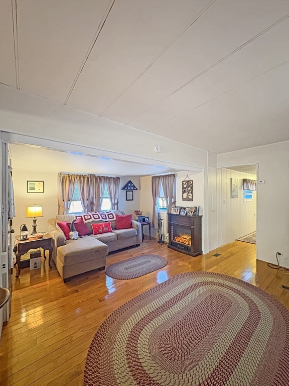 9 King Drive Wareham, MA 02576 - Photo 3 of 12 a living room with furniture and a table