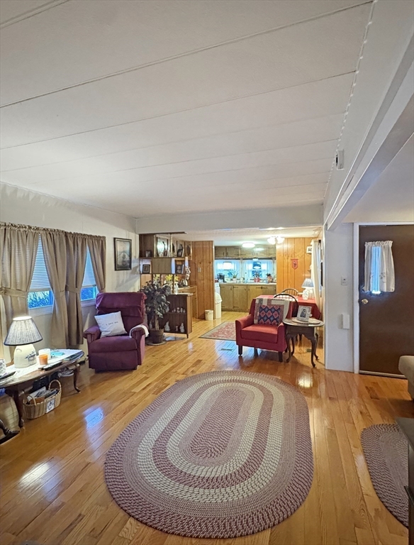 9 King Drive Wareham, MA 02576 - Photo 4 of 12 a living room with furniture and a wooden floor