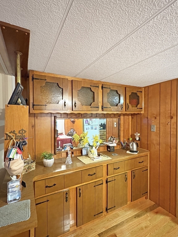 9 King Drive Wareham, MA 02576 - Photo 5 of 12 a kitchen with stainless steel appliances granite countertop a sink and cabinets