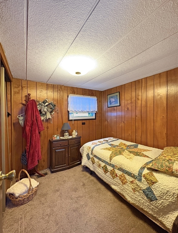 9 King Drive Wareham, MA 02576 - Photo 9 of 12 a bedroom with a bed and a closet