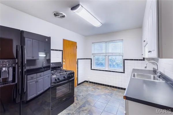 $1,700,000 | 8124-8130 Roxburgh Drive, Unit 1E 1W 2E 2W, St. Louis, MO 63105