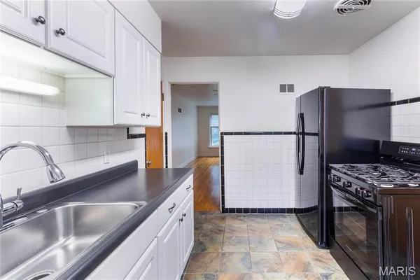 $1,700,000 | 8124-8130 Roxburgh Drive, Unit 1E 1W 2E 2W, St. Louis, MO 63105