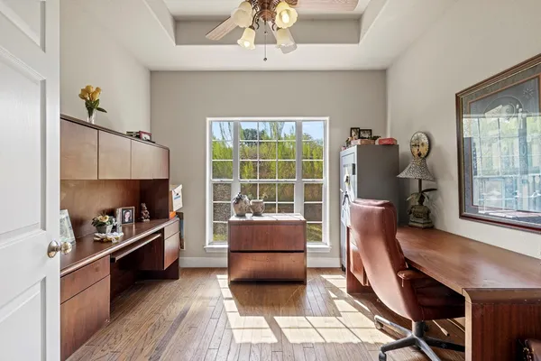 a bed room with furniture and a window