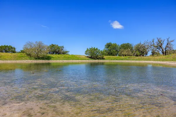a view of a lake with a lake in the background