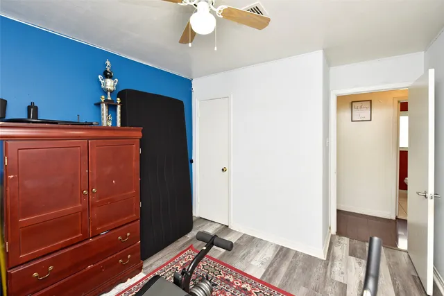 a view of a livingroom with wooden floor