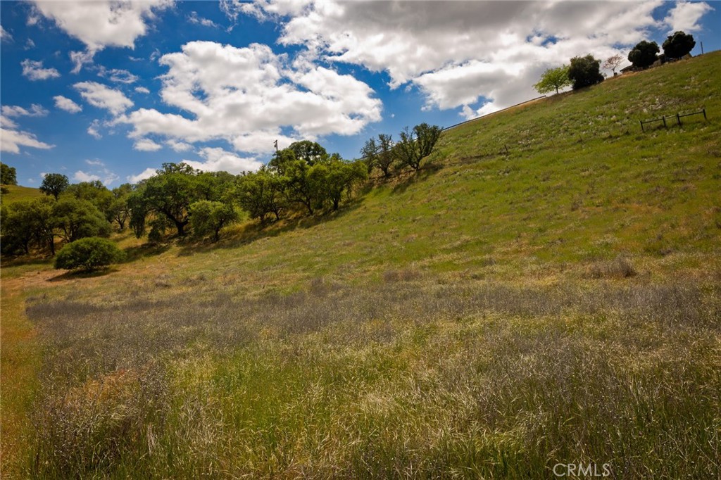 48 Blue Moon Road Paso Robles, CA 93446 - Photo 1 of 3 a view of a lake with a building