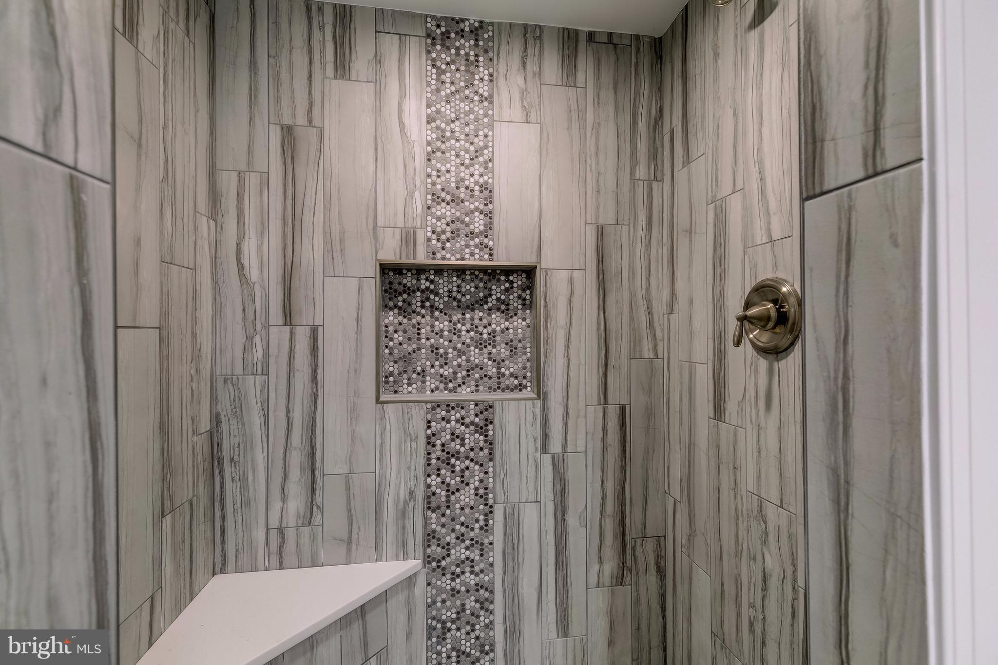 625 Edwards Road Annapolis, MD 21409 - Photo 25 of 30 a bathroom with a shower curtain and a window