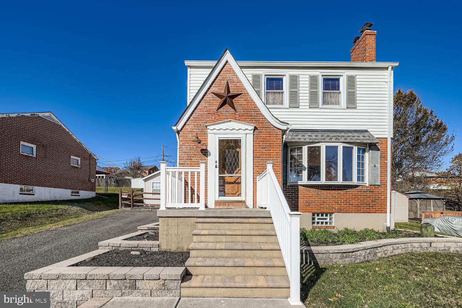 8004 Sagramore Road Rosedale, MD 21237 - Photo 2 of 34 a front view of a house with a yard