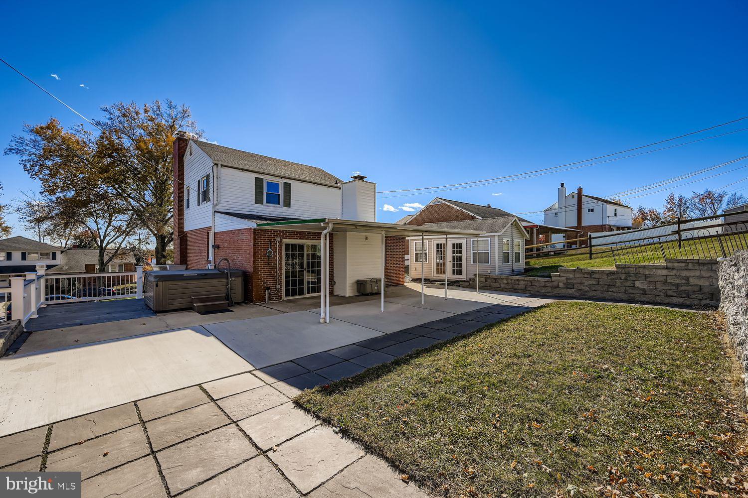 8004 Sagramore Road Rosedale, MD 21237 - Photo 29 of 34 a front view of a house with garden