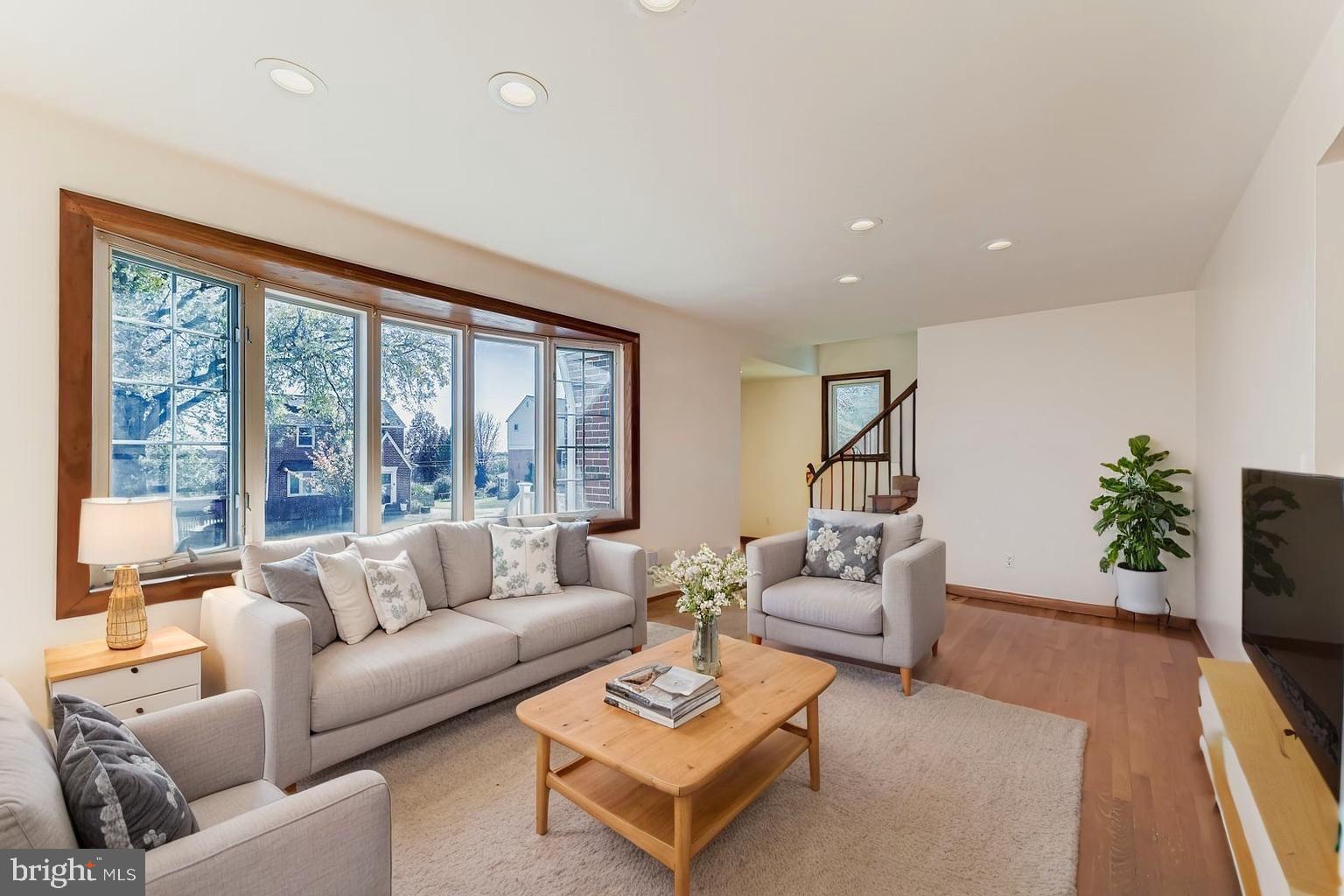 8004 Sagramore Road Rosedale, MD 21237 - Photo 4 of 34 a living room with furniture and a large window