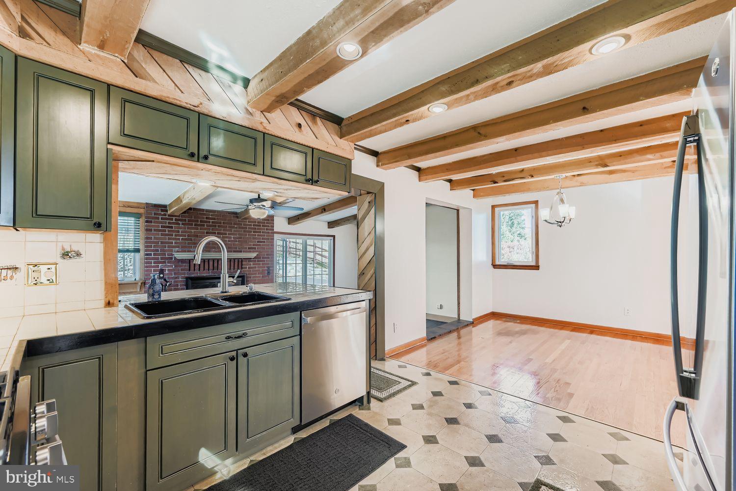 8004 Sagramore Road Rosedale, MD 21237 - Photo 7 of 34 a kitchen with a sink and cabinets